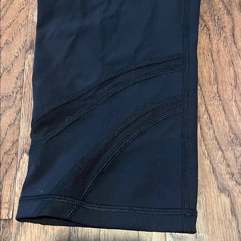 LuluLemon Black with Sheer Panel Leggings size 12 - Picture 2 of 7